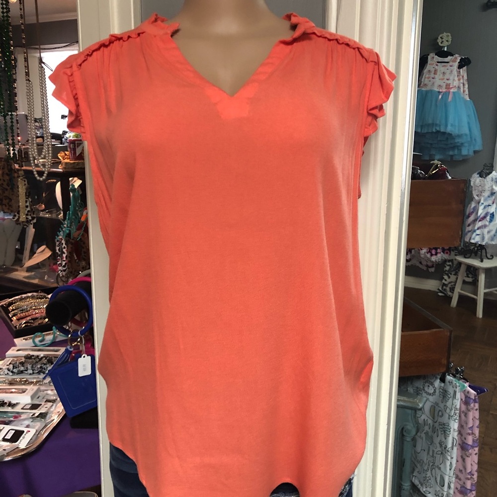 Pinkish orange top